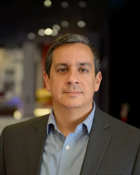 Head shot of Jorge Zamanillo, with blurred indeterminate background