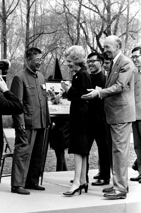 8931-15: Pat Nixon at an outdoor ceremony.