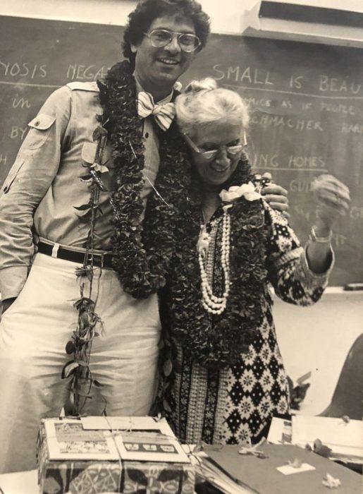 Black and white photo of Kuhn and Nathanson wearing leis