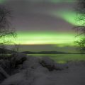 Greenish lights in night sky over Finland