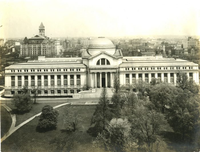 Black and white image of the NMNH building from across the Mall