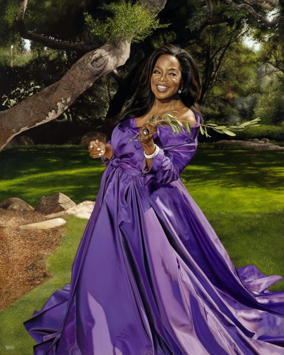 Portrait of Oprah Winfrey outdoors wearing a purple gown