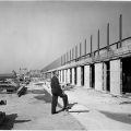 Frank Taylor stands in front of NMAH under construction
