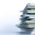 Stock image of a pile of paperwork in forlders