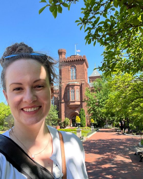 Alexis Miller with Smithsonian Castle as a backdrop