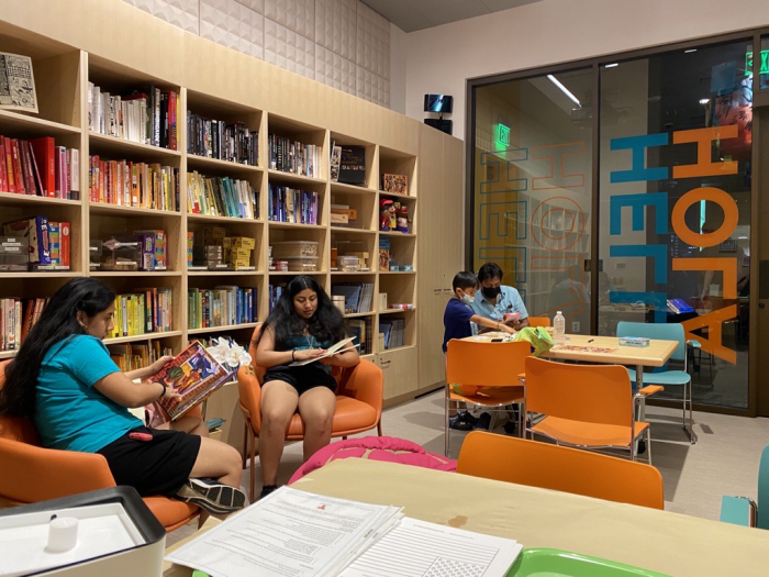 Two girls reading in the Learning Lounge