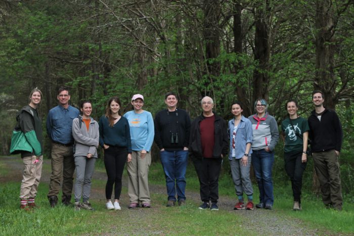 Group shot of NMNH team in the woods