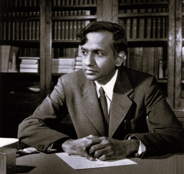 Black and white photo of ChandraSekhar at his desk