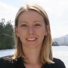 Headshot of Danielle DeLeo with lake in the background