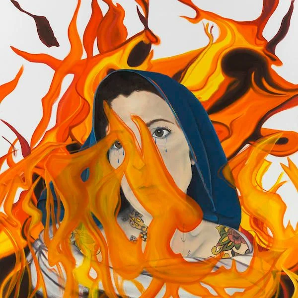 Artwork showing woman's head consumed by flames