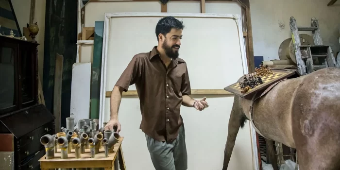 Screenshot of artist in his studio