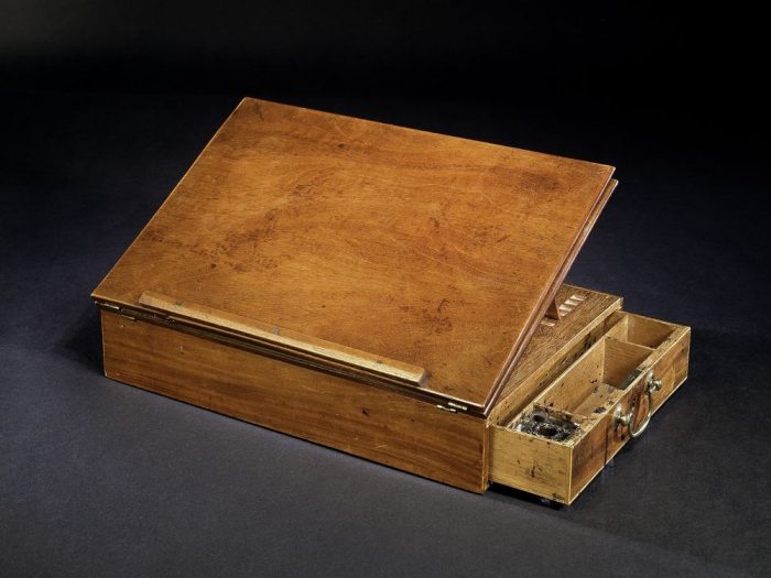 Wooden box with hinged easel and small, sectioned drawer