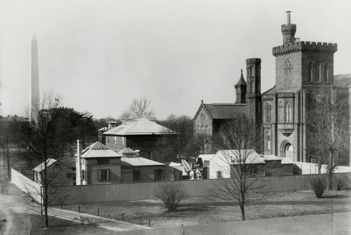 1909 image of small sheds and outbuilding in the South Yard of the Smithsonian Instiitution Building.