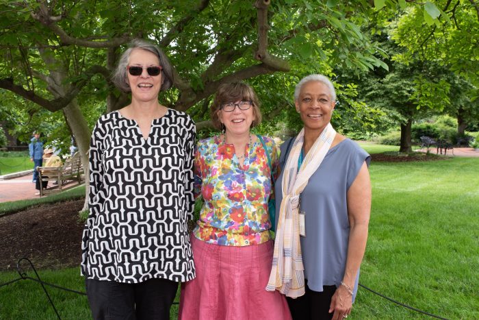 Bridget Balog with two volunteers in Haupt Garden