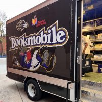 The Ravens Bookmobile parked outside the Boys and Girls Club
