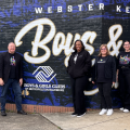 Smithsonian Staff posing in front of Webster Kendrick Boys and Girls Club in Baltimore