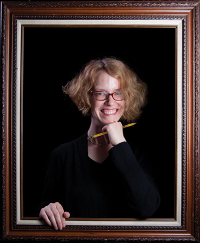 Portrait of Ellen Lupton against black background, with faux frame