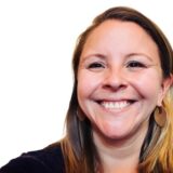 Thumbnail headshot of a smiling Ashley Naranjo