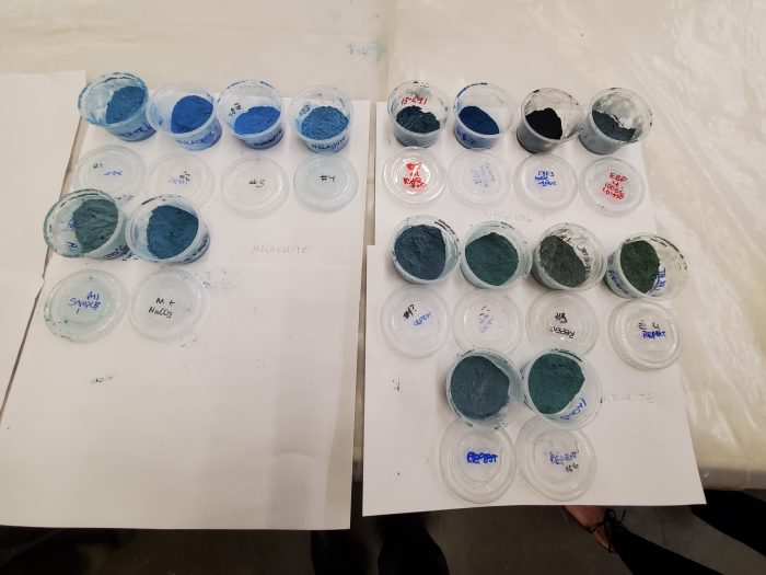 plastic sample cups of various pigments